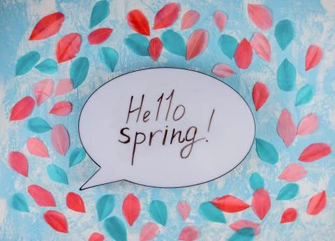Hello spring inscription on the speech bubble. Blue textured background with  Stock Photos