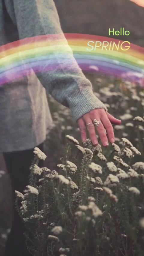 Hello Spring Vertical Lifestyle Background with Hand and Rainbow Stock Footage 331873192