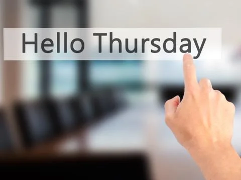 Hello Thursday - Hand pressing a button on blurred background concept . Busin Stock Photos