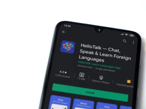 HelloTalk - Language learning app play store page on the display of a black m Stock Photos