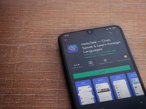 HelloTalk - Language learning app play store page on the display of a black m Stock Photos