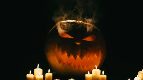 Helloween pumpkin with candles Stock Footage 94899454