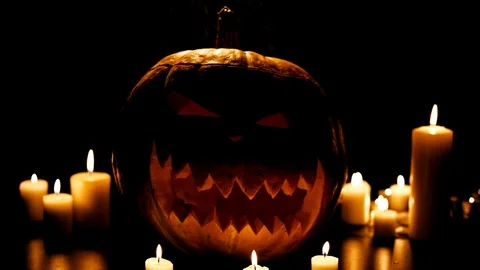 Helloween pumpkin with candles Stock Footage 95047376