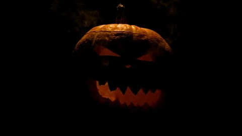 Helloween pumpkin with candles Stock Footage 95047554