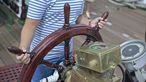 At the Helm: Navigating the Tall Ship Stock Footage 261680086