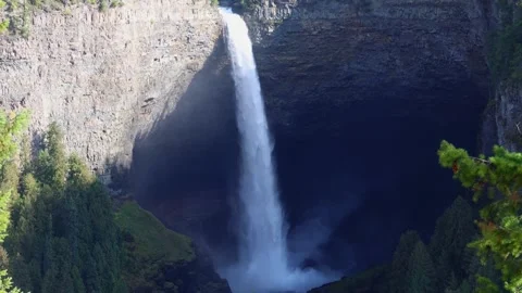Helmcken Falls, a high river pours into an open canyon Stock Footage 251925934