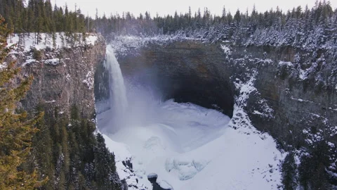 Helmcken Falls: waterfall in winter with ice cone, British Columbia 4k Stock Footage 166127011