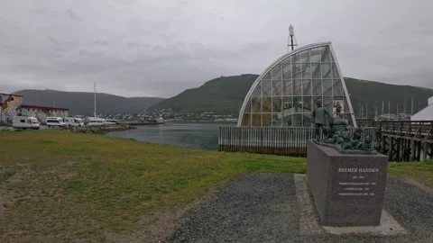 Helmer Hanssen statue and MS Polstjernan glass museum building in Tromso 動画素材 341697305