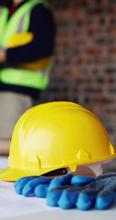 Helmet, architecture and ppe on construction site for safety, maintenance or Stock Footage 336853001