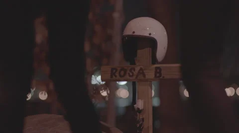 Helmet on a cross in grave Stock Footage 61771620