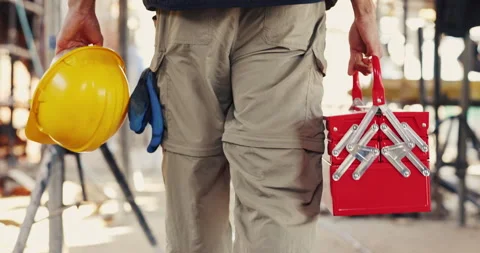 Helmet, hands and man on construction site with toolbox infrastructure and Stock Footage 336792071