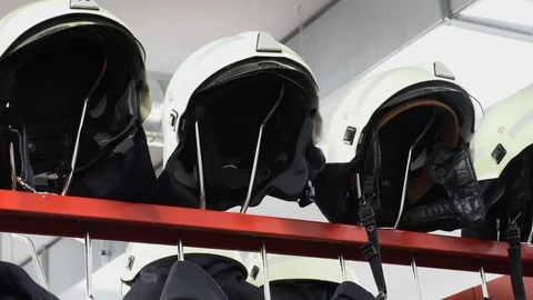 Helmets and jackets  for the fire brigade Stock Footage 108559481