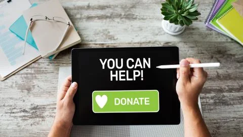 Help and donation button on device screen. 库存照片