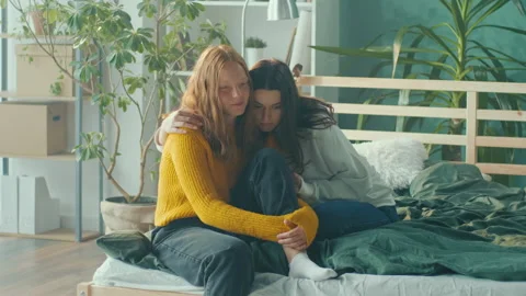 Help and Support. Red Haired Depressed Teenager Girl Talks to a Female Friend Video stock 212210773