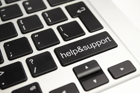 Help and support words on laptop keyboard. Help concept Photos