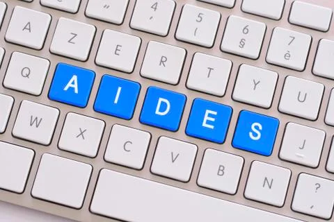 Help in blue on white keyboard Stock Photos