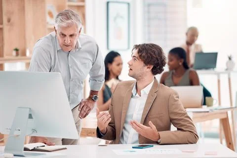 Help, coaching and man with manager at computer at tech startup with team leader Stock Photos