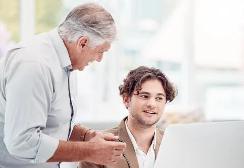 Help, coaching and man with manager at computer at tech startup with team leader Stock Photos