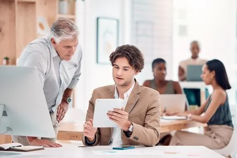 Help, coaching and man with manager at computer at tech startup with team leader Stock Photos