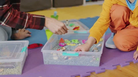 With the help of a dedicated and compassionate teacher, the young boy is able to Stock Footage 249657323