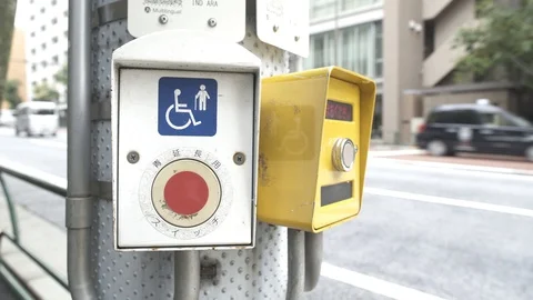Help for the disabled. The button on the traffic light at the intersection. Video stock 92731972