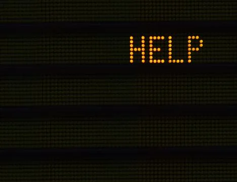HELP On Electronic Station Sign Stock-Fotos