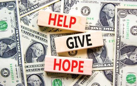 Help give hope symbol. Concept word Help give hope on beautiful wooden bloc.. Stock Photos