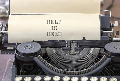 Help is here and support words symbol. Concept words Help is here typed on .. 写真素材