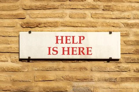 Help is here and support words symbol. Concept words Help is here on beauti.. Stock Photos