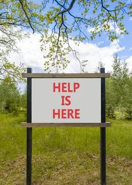 Help is here and support words symbol. Concept words Help is here on beautifu Stock Photos
