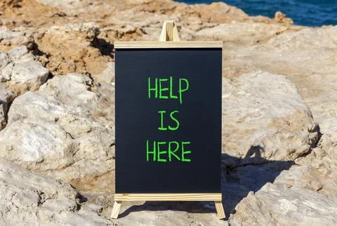 Help is here and support words symbol. Concept words Help is here on beauti.. Stock Photos