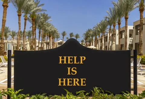 Help is here and support words symbol. Concept words Help is here on beautifu Stock Photos
