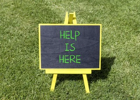 Help is here and support words symbol. Concept words Help is here on beauti.. Stock Photos