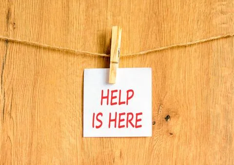 Help is here and support words symbol. Concept words Help is here on beauti.. Stock Photos