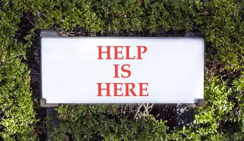 Help is here and support words symbol. Concept words Help is here on beauti.. Stock Photos