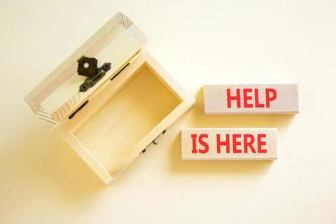 Help is here and support words symbol. Concept words Help is here on beauti.. Stockfoto's