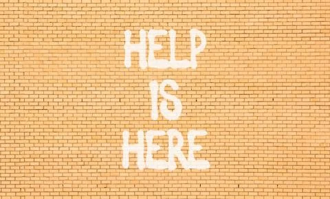 Help is here and support words symbol. Concept words Help is here on beauti.. Stock Photos