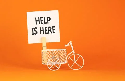 Help is here and support words symbol. Concept words Help is here on beauti.. Stock Photos