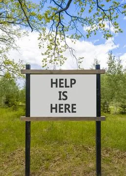 Help is here and support words symbol. Concept words Help is here on beautifu Stock Photos