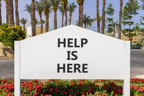 Help is here and support words symbol. Concept words Help is here on beauti.. Stock Photos