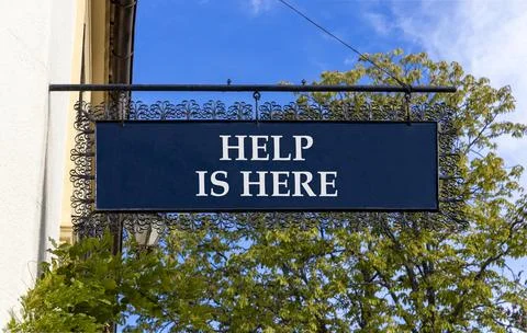 Help is here and support words symbol. Concept words Help is here on beauti.. Stock Photos