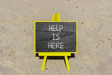 Help is here and support words symbol. Concept words Help is here on beauti.. Stock Photos