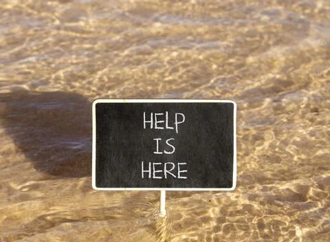 Help is here and support words symbol. Concept words Help is here on beauti.. Stock Photos