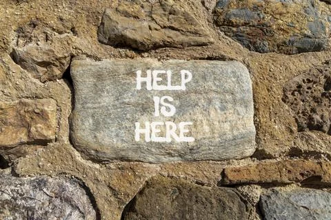 Help is here and support words symbol. Concept words Help is here on beauti.. Stock Photos