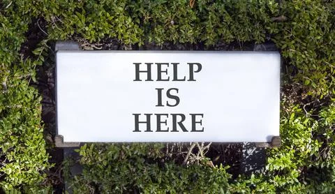 Help is here and support words symbol. Concept words Help is here on beauti.. Stock Photos