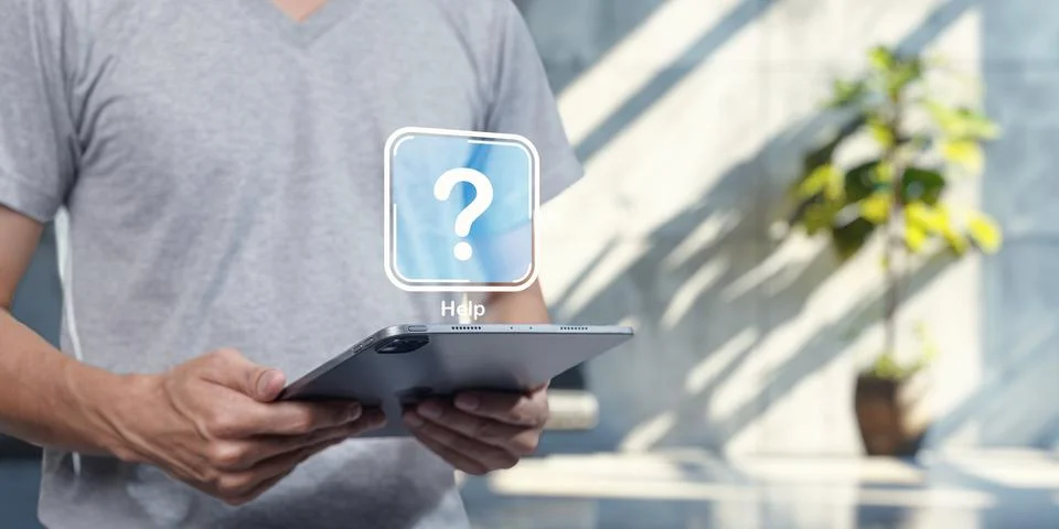 Help Icon on Tablet for Software Support and Program Assistance Stock Photos