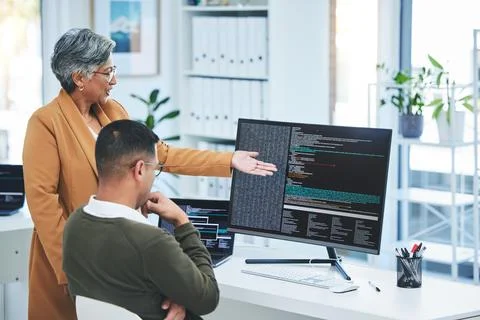 Help, manager and employee with computer screen, programming and code with Fotos Stock