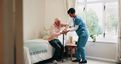 Help, nurse and senior man with cane in home for healthcare, elderly support or Stock Footage 338394749