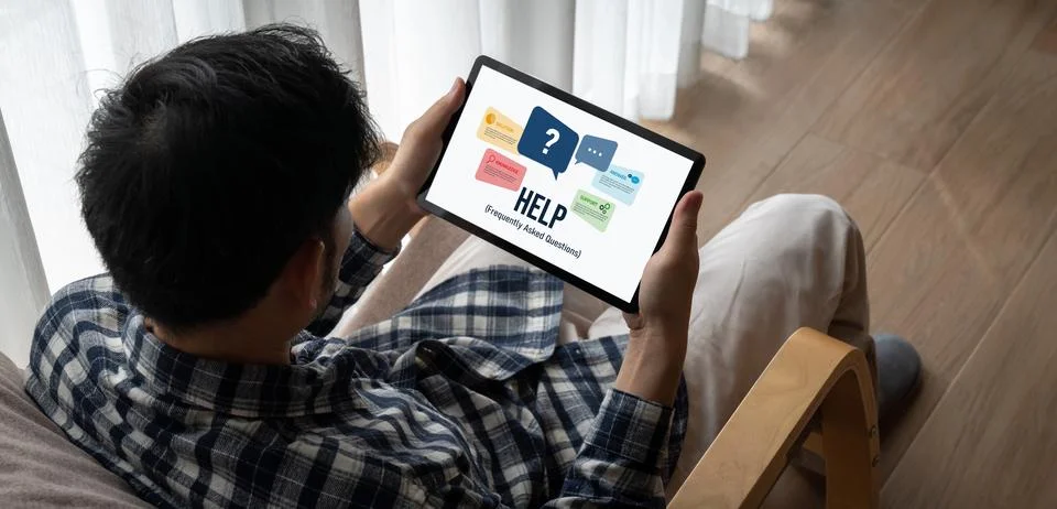 Help screen on the website provide answer to FAQ snugly Stock Photos