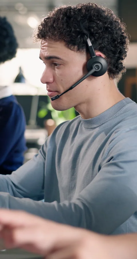 Help, service and man with headset in agency for customer support or online Stock Footage 340629304